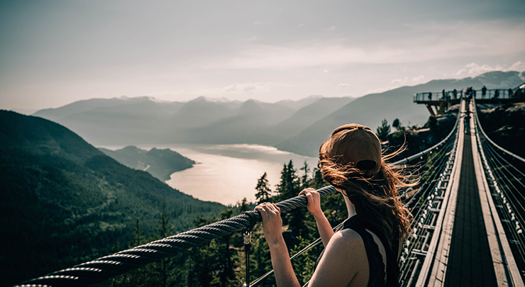 lady looking over the suspension bridge